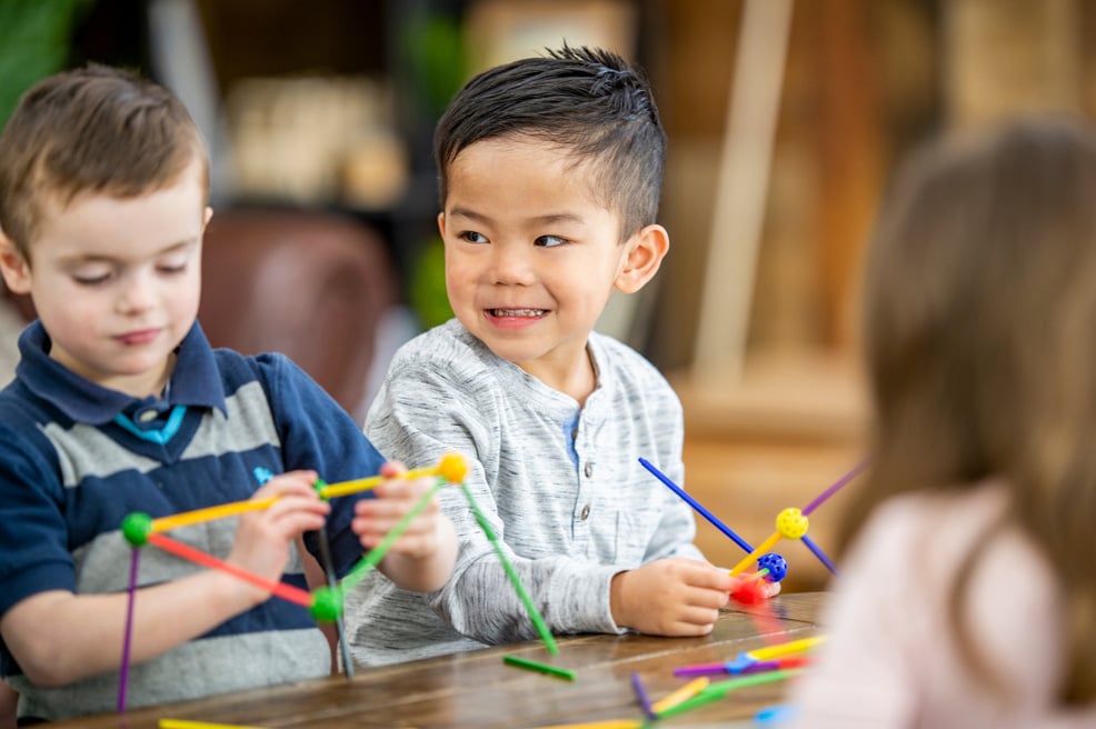 Children playing with STEM toys